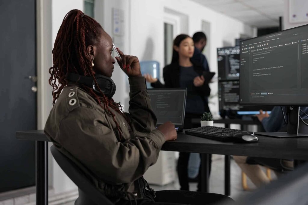 Software developers working on custom web application